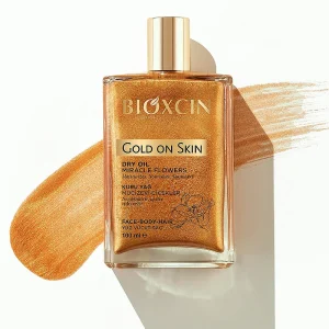 روغن بدن شاین دار بیوکسین سری gold on skin برای صورت، بدن و مو حجم 100 میل Bioxcin Gold On Skin Shine Dry Oil 100 ml